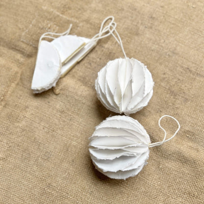 White ball - in paper